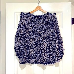 Brand new fall blouse from a local boutique. Never worn but does not have tags.